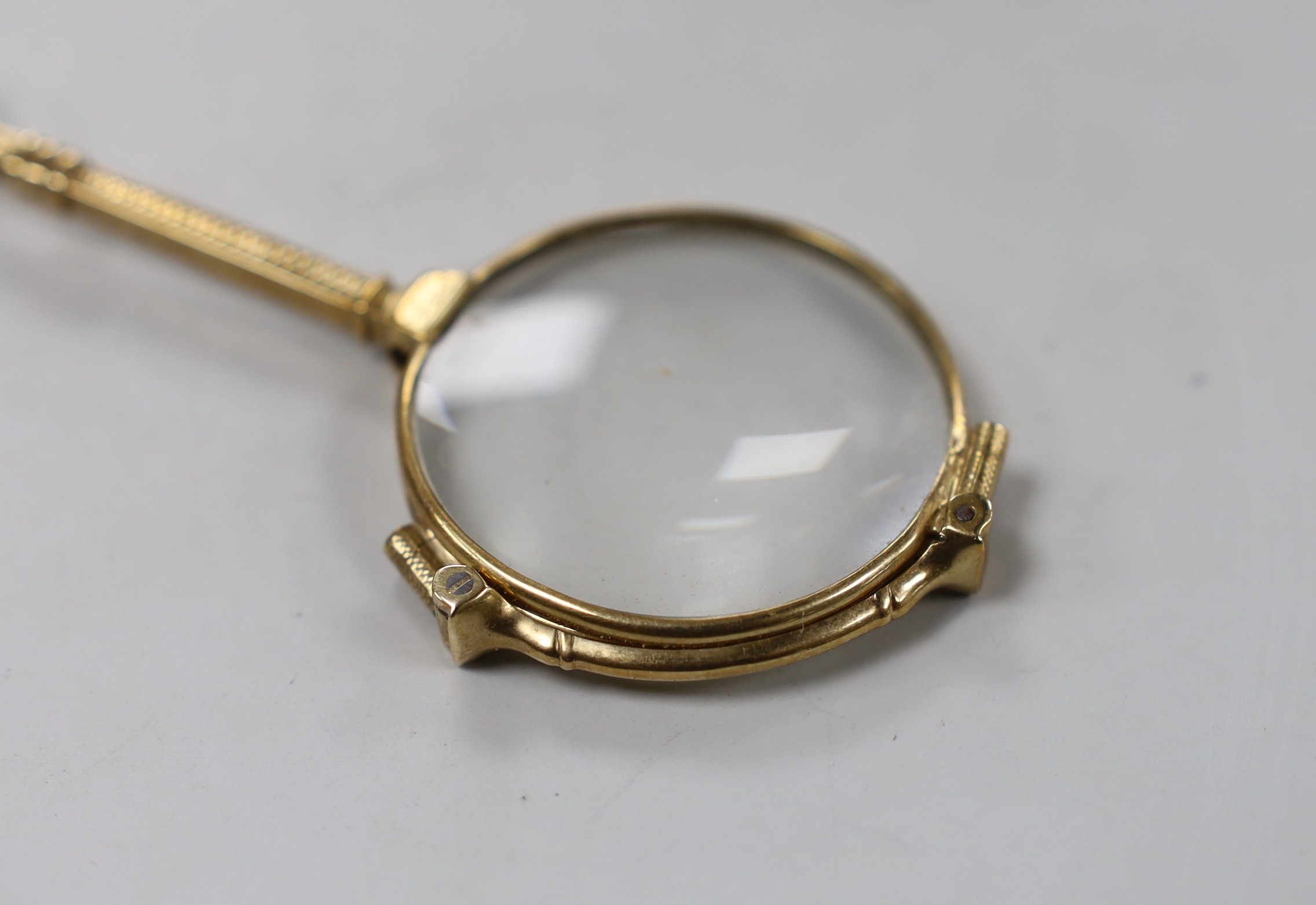 A pair of 9ct mounted lorgnettes, 10.2cm.